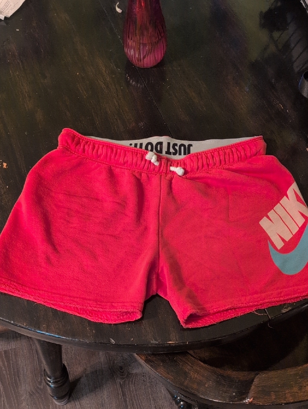Nike Women's Hot Pink Athletic Shorts with Light Blue Swoosh